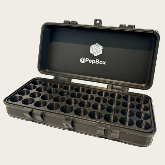 Black PepBox case with open lid on a white surface